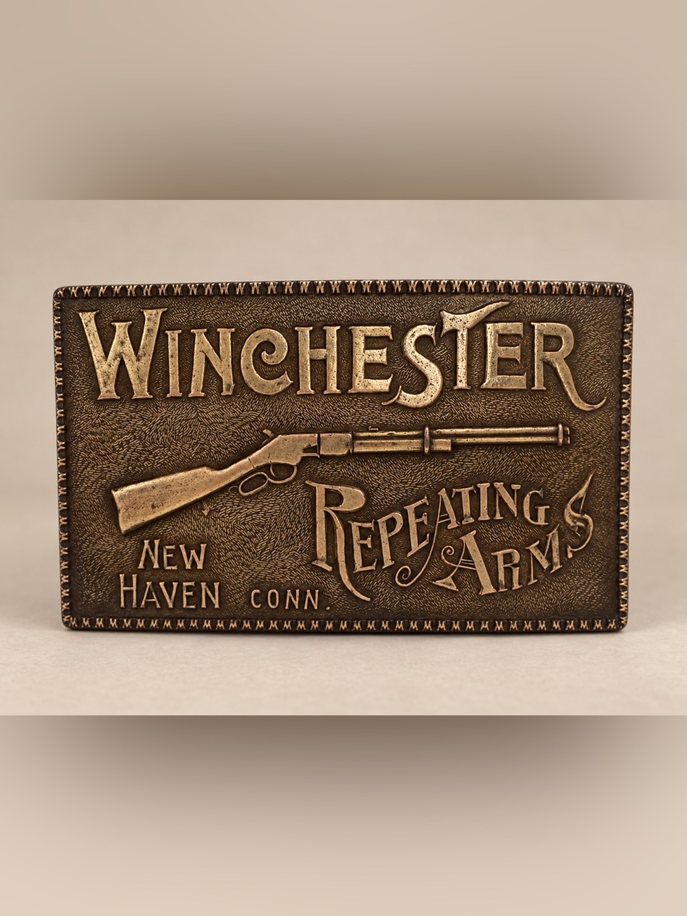 Winchester Bronze Tone Repeating Arms Belt Buckle